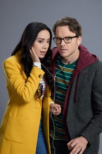 Aimee Garcia is Birdie Case and Paul Campbell is Alden in THE CASES OF MYSTERY LANE: DEATH IS LISTENING | ©2024 Hallmark